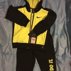 black and yellow nike jogging suit